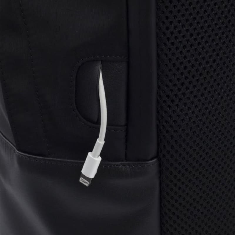 The Classic Backpack from ISM Cable passthrough for quick charging on the go.