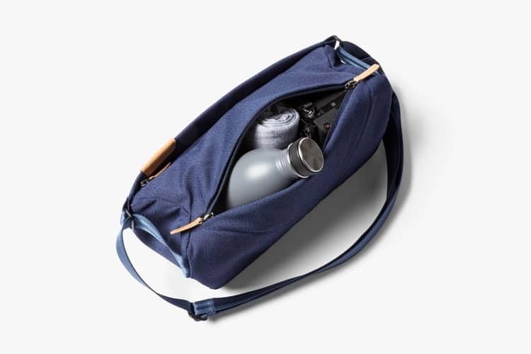 Bellroy Sling Surprising amount of space for how small this thing can look on the body. Mirrorless cameras with small/pancake lenses will likely fit, for example.
